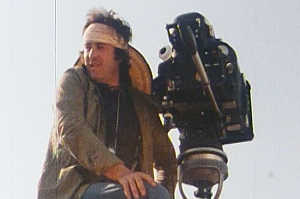 Bernardo Bertolucci durante uno de sus rodajes